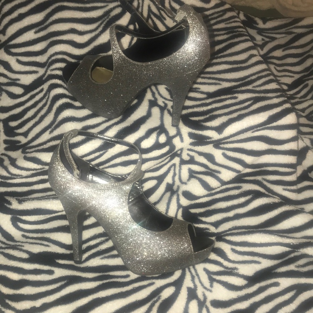 Silver open toe heels 👠  about 3 inches high